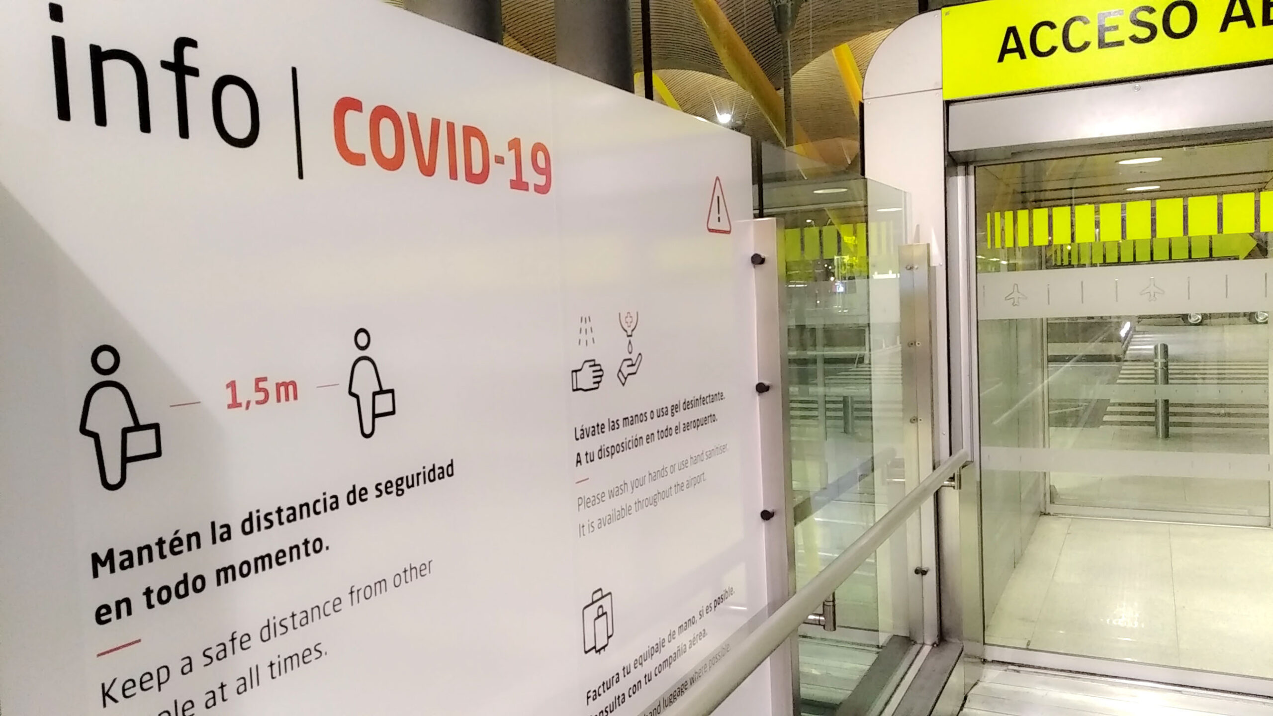 empty airport of Madrid, Spain, with a control panel with a sign